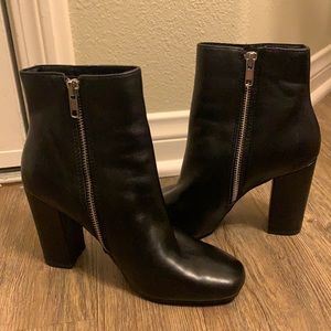 NEW! Never worn! Black leather booties.